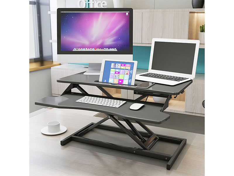 Compact adjustable desk