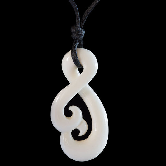 Twist Koru, handcrafted bone pendant