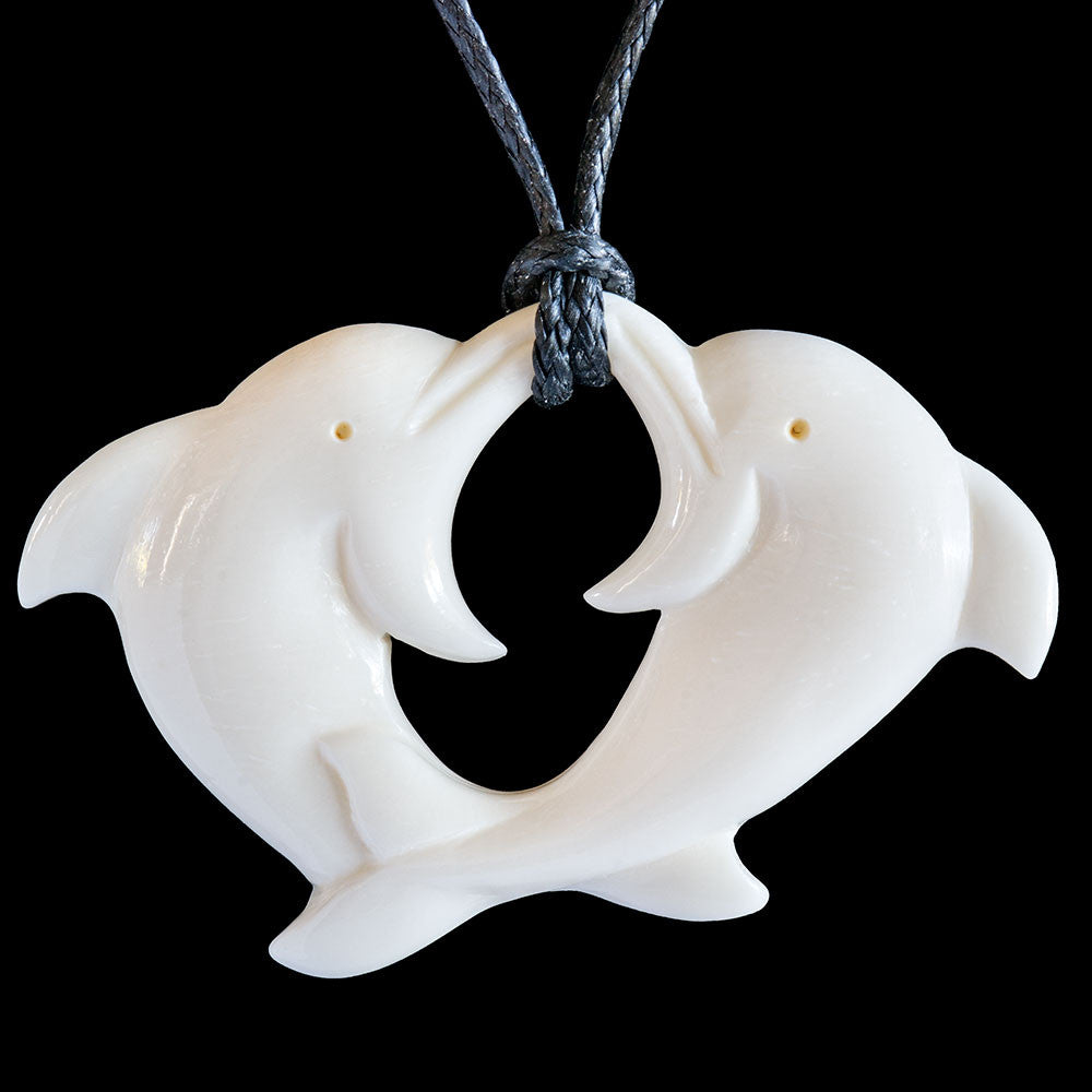 Playing Dolphins, hand-crafted bone pendant