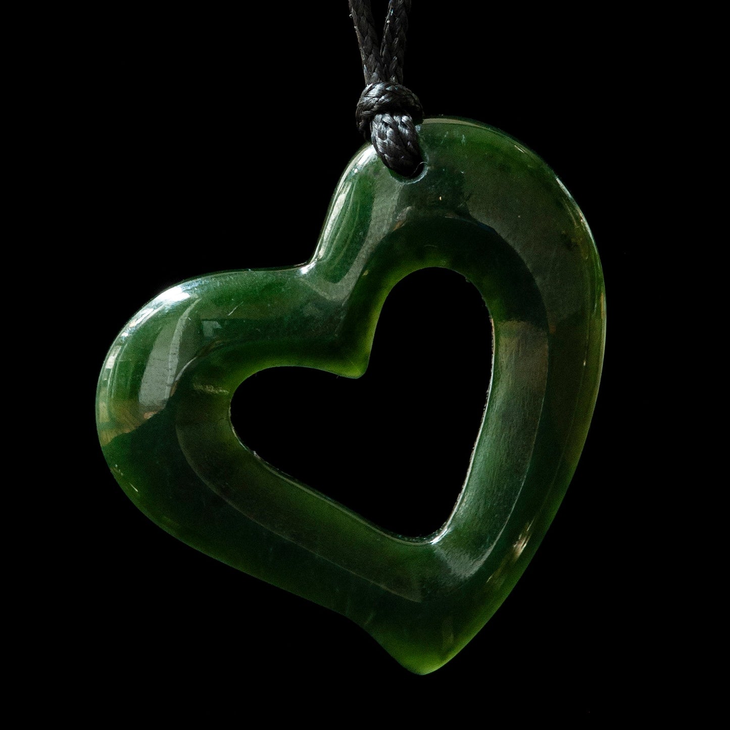 Pounamu Heart Pendant Hanging from Left