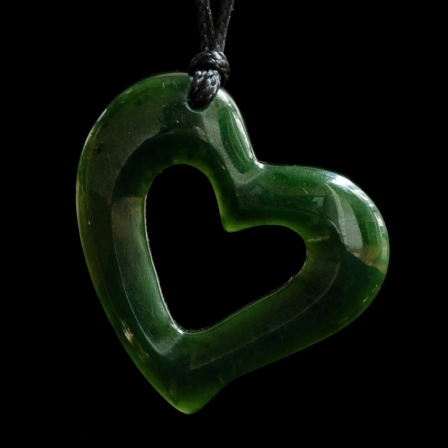 Pounamu Heart Pendant Hanging from Right