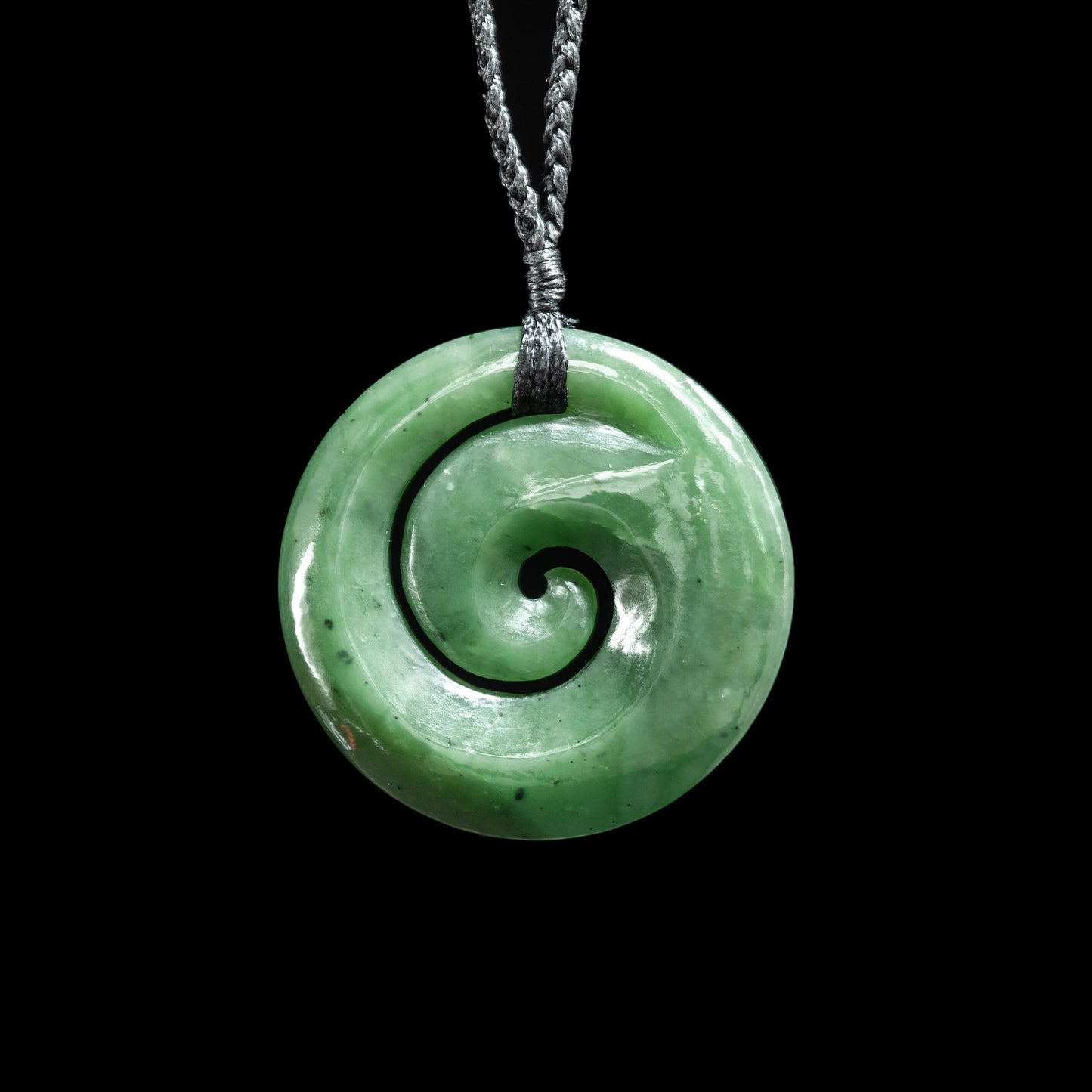 small Koru, closed form, hand-crafted jade pendant