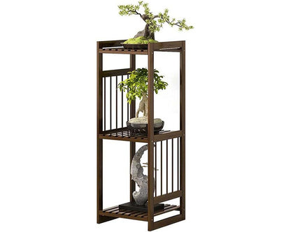 brown bamboo plant rack