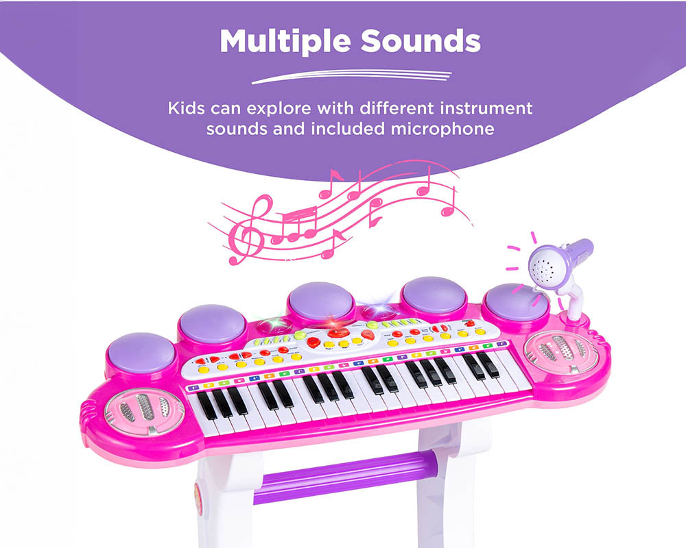 Pink piano with stool and stand